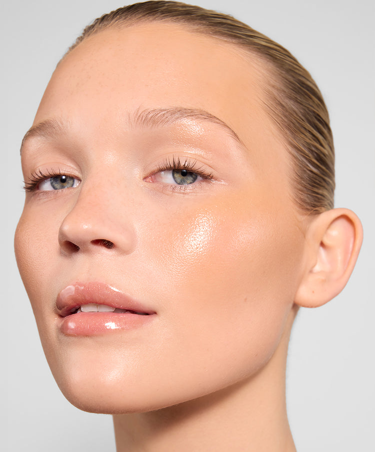 Jemima wears Topaz Lip Gloss,<br> Sand Cream Bronzer & Gloss Highlighter