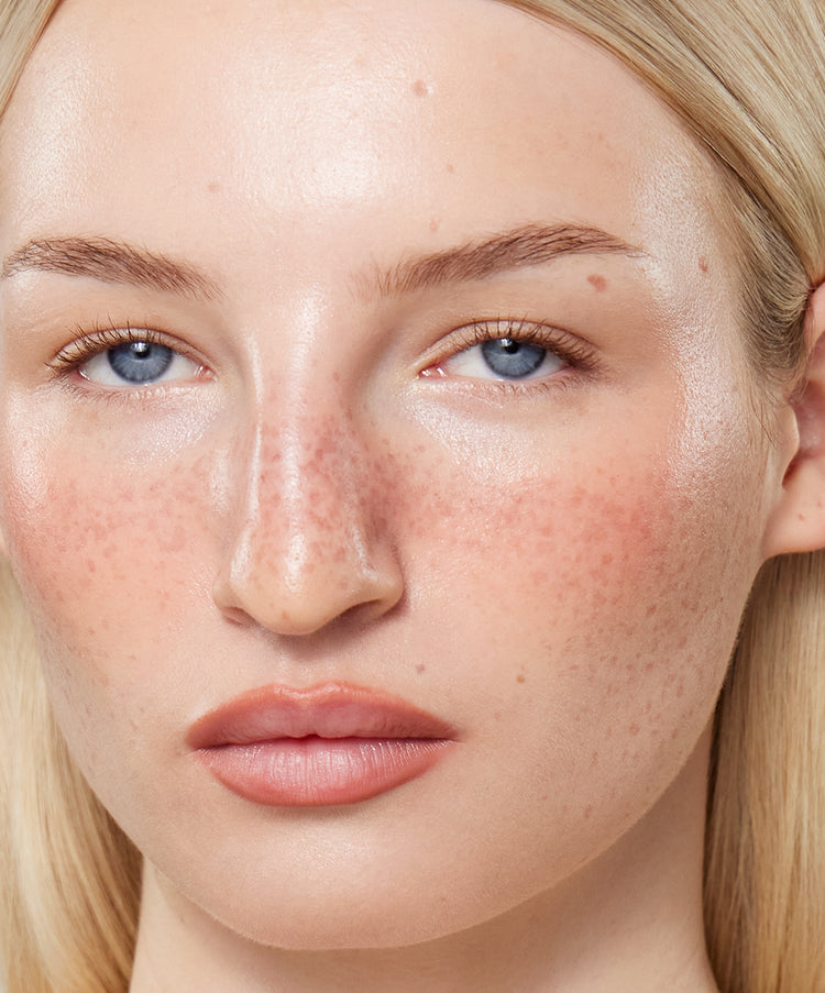 | desc: | text: light Model wears Lip Sculpt in Rosewood